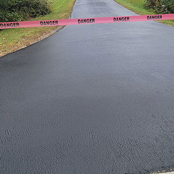 Sealcoated Road with Caution tape